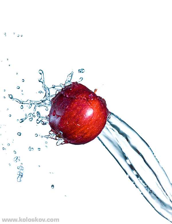 Water splash photography with red apple Water splash image with red apple