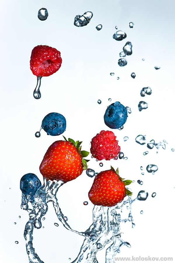 Water splash with strawberry, blueberry and raspberry Hith speed photography with fruits and water
