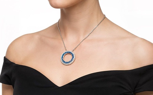 AI-generated on-model necklace photography with a circular gemstone pendant